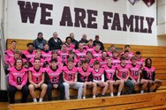 CNY football coach surprised as team reveals new jersey to support wife’s breast cancer fight (video)