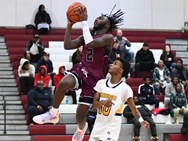 Boys basketball roundup: Senior leads Corcoran to city showcase victory over Henninger (40 photos)